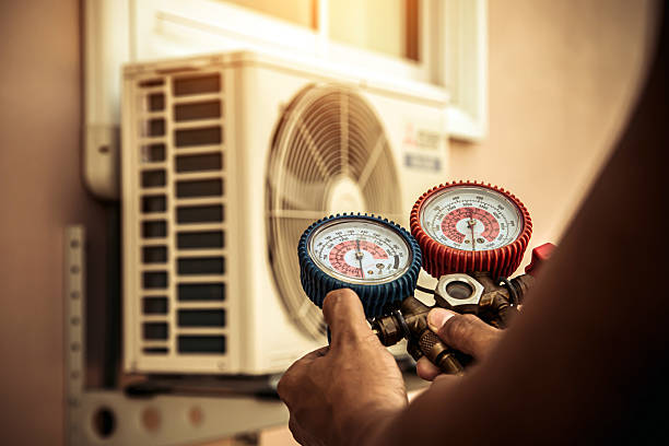 Professional Hvac technician working in Riderwood, MD